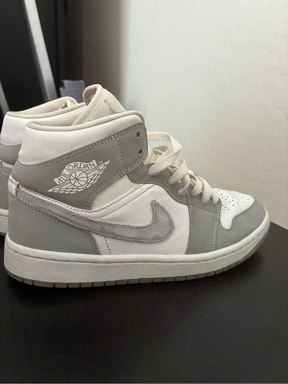 Jordan Women’s High-Top Sneakers in White and Light Gray